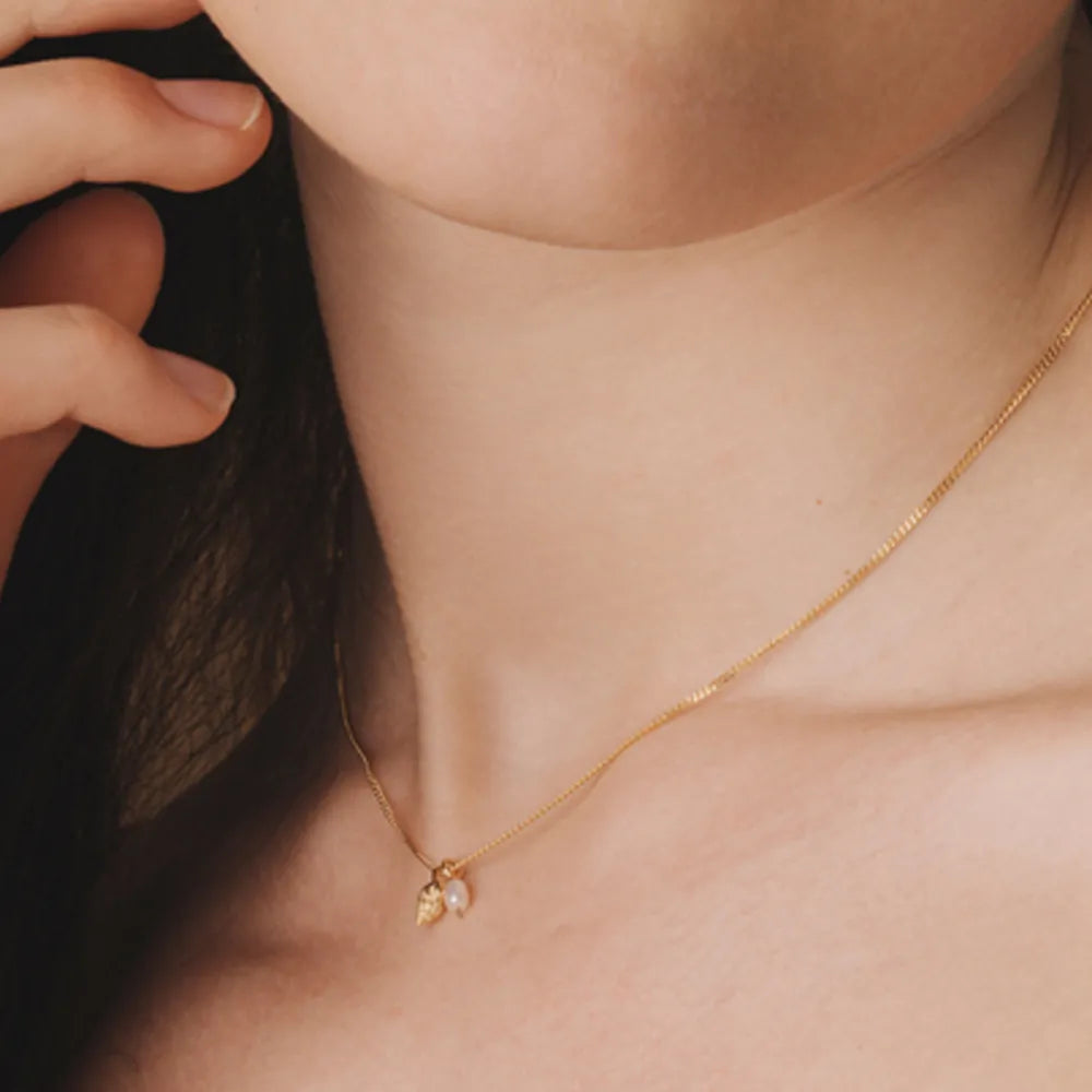 Produktbild Halskette Schneckenmuschel mit Perle - gold